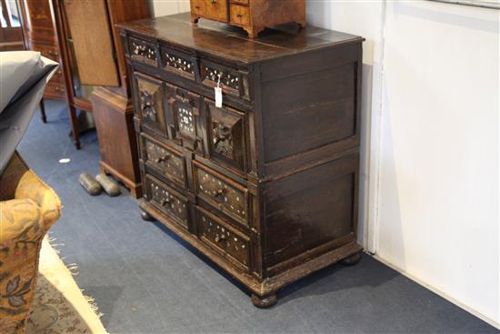 A late 17th century mother of pearl inlaid oak chest, W.3ft 2.5in. D.1ft 9in. H.3ft 1in.